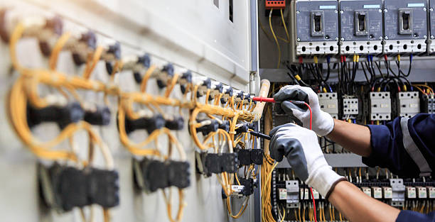 Professional Electrical Panel Upgrade technician working in Caldwell County County, TX